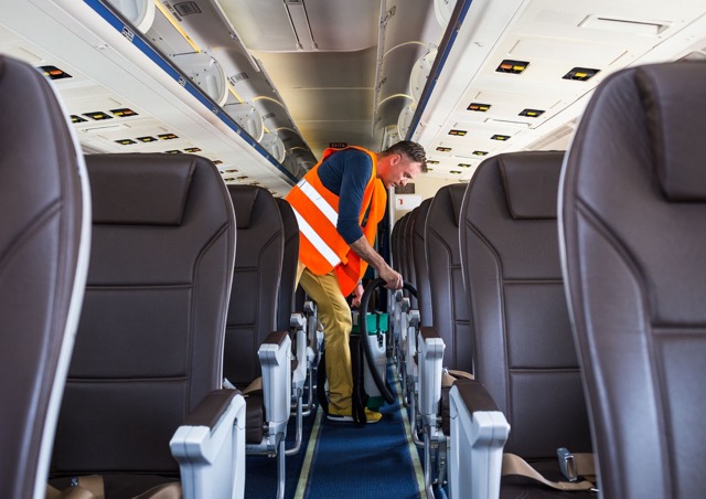 man-cleaning-the-private-jet